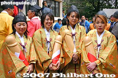 Procession maidens pose with wooden penises. Tagata Shrine Honen Festival
Keywords: aichi komaki kumano jinja shrine penis festival fertility honen matsuri3