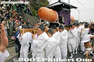 The second mikoshi features the giant penis carried by 12 men at a time, all of whom are age 42, considered to be an unlucky age (yakudoshi) for men. They seek protection by carrying the phallus.
Keywords: aichi komaki jinja shrine penis festival fertility honen matsuri shinto