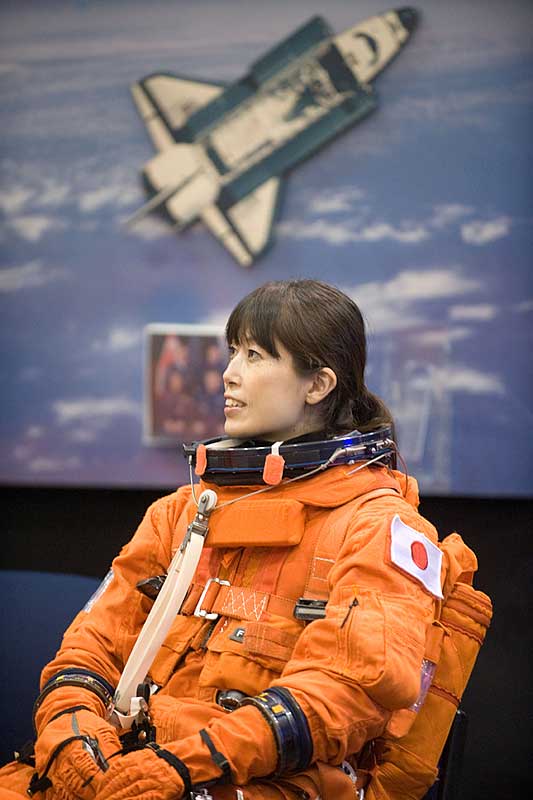 Naoko Yamazaki, STS-131 mission specialist, attired in a training version of her shuttle launch and entry suit, awaits the start of a training session in the Space Vehicle Mock-up Facility at NASA's Johnson Space Center.
14 Sept. 2009 --- Japan Aerospace Exploration Agency (JAXA) astronaut Naoko Yamazaki, STS-131 mission specialist, attired in a training version of her shuttle launch and entry suit, awaits the start of a training session in the Space Vehicle Mock-up Facility at NASA's Johnson Space Center.
