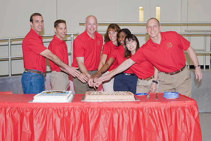 10 March 2010 --- The STS-131 crew members pose for a photo during a cake-cutting ceremony in the Jake Garn Simulation and Training Facility at NASA's Johnson Space Center.
10 March 2010 --- The STS-131 crew members pose for a photo during a cake-cutting ceremony in the Jake Garn Simulation and Training Facility at NASA's Johnson Space Center. Pictured from the left are NASA astronauts Rick Mastracchio, mission specialist; James P. Dutton Jr., pilot; Alan Poindexter, commander; Dorothy Metcalf-Lindenburger, Stephanie Wilson, Japan Aerospace Exploration Agency's Naoko Yamazaki and NASA astronaut Clayton Anderson, all mission specialists.
