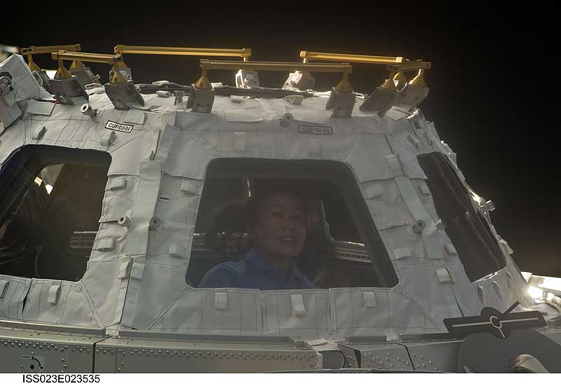 14 April 2010 --- Japan Aerospace Exploration Agency astronaut Naoko Yamazaki, STS-131 mission specialist, is pictured in a window of the Cupola for operating the robotic arm.
14 April 2010 --- Japan Aerospace Exploration Agency astronaut Naoko Yamazaki, STS-131 mission specialist, is pictured in a window of the Cupola of the International Space Station while space shuttle Discovery remains docked with the station. The Cupola enables direct visibility of the robotic arm instead of relying on monitors.
