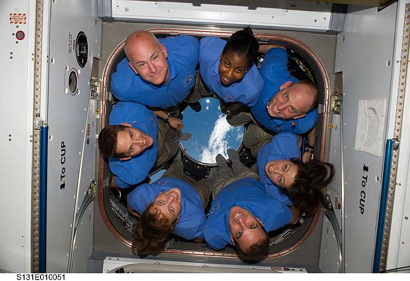 14 April 2010 --- The STS-131 crew members pose for a portrait in the Cupola of the International Space Station while space shuttle Discovery remains docked with the station. 
14 April 2010 --- The STS-131 crew members pose for a portrait in the Cupola of the International Space Station while space shuttle Discovery remains docked with the station. Pictured counter-clockwise (from top left) are NASA astronauts Alan Poindexter, commander; James P. Dutton Jr., pilot; Dorothy Metcalf-Lindenburger, Rick Mastracchio, Japan Aerospace Exploration Agency (JAXA) astronaut Naoko Yamazaki, NASA astronauts Clayton Anderson and Stephanie Wilson, all mission specialists.
