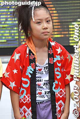 This girl's homemade happi coat says "Waraji Matsuri."
Keywords: fukushima waraji matsuri japanchild