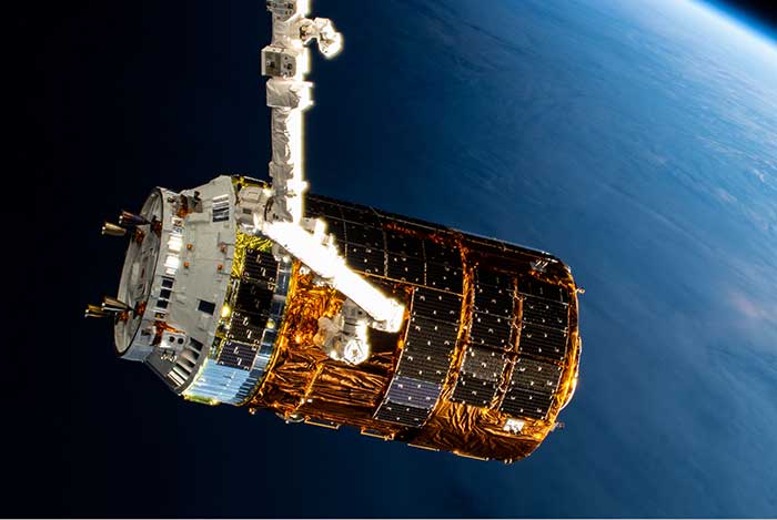 NASA photo of Kounotori. Kounotori was launched on a rocket, released into space, maneuvered to the ISS, then grabbed by the ISS’ robotic arm for docking. 
After the cargo was unloaded, Kounotori was filled with ISS waste materials and dropped to Earth to burn up during re-entry.
“Kounotori” is the Japanese word for stork which can mean “bird of happiness.” Because of this auspicious meaning, “Kounotori” became the nickname of the  It certainly was a “bird” delivering happiness and important things. The kounotori stork is endangered in Japan.
