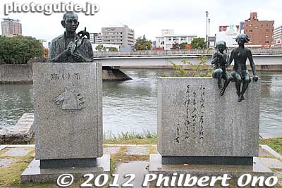 Monuments abound in the Peace Park. In the background is Aioi Bridge, the original target of the atomic bomb.
Keywords: hiroshima peace memorial park atomic bomb dome