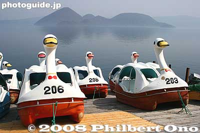Swan boats. You can pedal pretty far out in these things, but not to the Nakajima islands.
Keywords: hokkaido toyako-cho onsen spa hot spring crater lake toya nakajima islands mountains swan boats