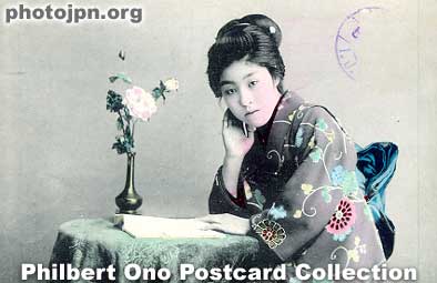 Flower in Vase. Nicely composed photograph. With a serene-looking face, she's an ideal postcard model. She also appears in the next postcard.
Keywords: japanese vintage postcards nihon bijin women woman beauty kimono flowers