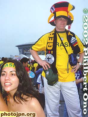 Supporters of Brazil and Germany side-by-side.
Keywords: world cup soccer game yokohama 2002 fans brazil germany