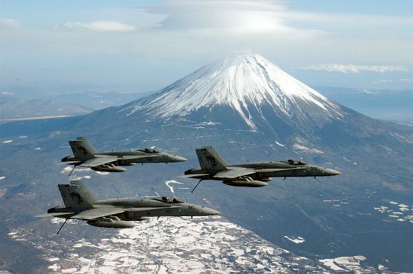 Yokosuka, Japan (Dec. 12, 2002) -- One of the first squadrons airborne to commemorate the F/A-18 program’s 5 millionth flight hour was Strike Fighter Squadron One Ninety Two (VFA-192) embarked aboard USS Kitty Hawk.
Yokosuka, Japan (Dec. 12, 2002) -- One of the first squadrons airborne to commemorate the F/A-18 program’s 5 millionth flight hour was Strike Fighter Squadron One Ninety Two (VFA-192) embarked aboard USS Kitty Hawk (CV 63). The Kitty Hawk is the U.S. Navy’s only permanently forward-deployed aircraft carrier. U.S. Navy photo by Lt. Cmdr. William Koyama. (RELEASED)
