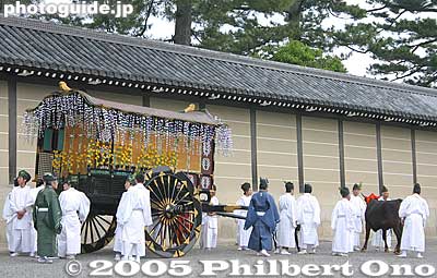One of Kyoto's Big Three Festivals held on May 15. The Aoi Matsuri's colorful procession of over 500 people in Heian-Period costumes start off at the Kyoto Gosho Imperial Palace and head for the Shimogamo and Kamigamo Shrines. 
Kyoto Gosho Imperial Palace 京都御所: The first ox carriage waits for the procession to start. The ox carriage is called a gissha. 牛車
Keywords: kyoto aoi matsuri festival heian