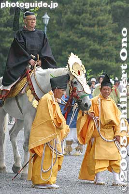 The procession's highest-ranking official called Chokushi. An Imperial Messenger. The horse is highly decorated. 勅使
Keywords: kyoto aoi matsuri festival heian
