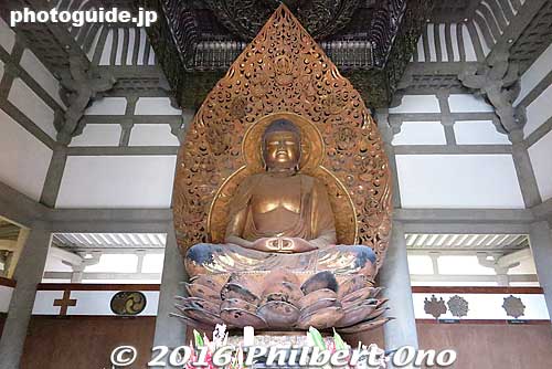 Since photography inside the central hall is not allowed, here's a photo of the replica at Valley of the Temples in Hawaii. It is very similar. One thing missing are the celestial Buddhas decorating the white walls behind the Buddha.
Keywords: kyoto uji byodo-in buddhist temple