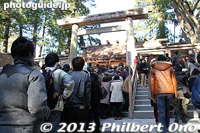 The bottleneck at Naiku was this little torii which most people wanted to walk through at the top of the steps. People like me who didn't have time opted to go up the steps on the right side in no time. 
Keywords: mie ise jingu japanshrine shinto hatsumode new year&#039;s day shogatsu worshippers japannationalpark