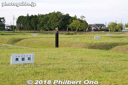 An outdoor 1/10-scale model of the Saiku Palace site (700 m x 2 km) was created near the Saio Woods. It had a grid layout of blocks as shown here. The site included buildings for the Saikuryo Government that govenred the Saiku Palace.
Known blocks are labeled like here. The trees in the background in this photo shows the Saio Woods where the princess lived.
Keywords: mie meiwa saiku