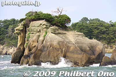 THe name "Matsushima" of course means "Pine Islands," so you may hear "Matsushima" in other places in Japan wherever there are pine-clad islands.  
Keywords: miyagi matsushima-machi nihon sankei scenic trio pine trees islands boat cruise 