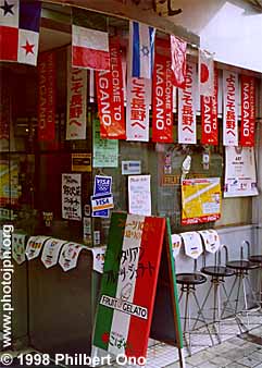 Fruit gelato stand
Fruit gelato storefront with national flags and "Welcome to Nagano" signs.
Keywords: nagano prefecture 1998 winter olympics