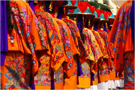 October:  A parade of traditional Okinawan Kimonos and headwear takes place every year on Kokusai Street in Naha, where a reenactment of the coronation of the King and Queen of the Ryukyu Kingdom is performed.
Photo copyright 2009 Michael Lynch.
Keywords: okinawa seasons 