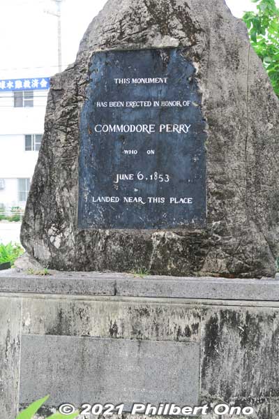 Back of Perry Monument: This monument has been erected in honor of COMMODORE PERRY who on June 6, 1853 landed near this place.
The lower plaque is inscribed with Perry's quote when he visited Shuri Castle:

PROSPERITY TO THE LEW CHEWANS, AND
MAY THEY AND THE AMERICANS ALWAYS BE
FRIENDS.

COMMODORE PERRY AT A RECEPTION IN
HIS HONOR (THE ROYAL GUEST
HOUSE) SHURI, OKINAWA, JUNE 6, 1853
Keywords: okinawa naha foreigner cemetery perry monument