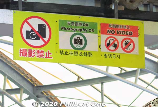 Confusing signage, but still photos are okay, but video prohibited.
