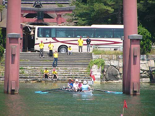 A busload of tourists even stopped to gawk at the spectacle of rowers around the torii.

