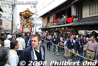 On a narrower street, there are houses with open windows on the upper floor which is almost the same level as the float.
Keywords: shiga otsu matsuri festival floats 