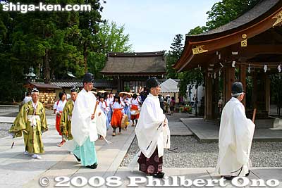 Keywords: shiga taga-cho taga taisha shrine shinto festival matsuri rice seedlings paddy paddies planting priests