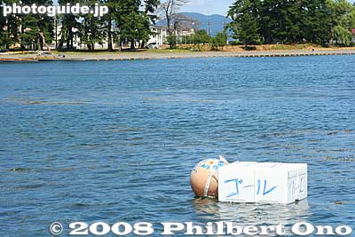 Finish line. It cost only 500 yen (insurance) to race in the regatta. You do not have to form a rowing team to participate. Single individuals could also register to race in the regatta.
Keywords: shiga takashima imazu regatta lake biwa rowing race boats