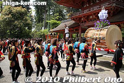 "Ayame" means iris flower, in reference to women. Out of the 30+ portable shrines (mikoshi) and taiko drums to be paraded during the festival, two of them, called Ayame, are carried only by women. These women will carry the Ayame mikoshi and tai
Keywords: shiga yasu hyozu taisha shrine matsuri festival mikoshi portable shrine
