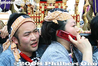 Never too busy for a phone call.
Keywords: tokyo taito-ku asakusa sanja matsuri festival sensoji mikoshi portable shrine crowd cell phone matsuribijin