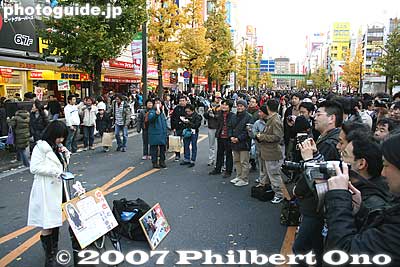 Another one is happy to sing while a horde of amateur photographers click away.
Keywords: tokyo chiyoda-ku ward akihabara electronics shops stores shopping street performers singers