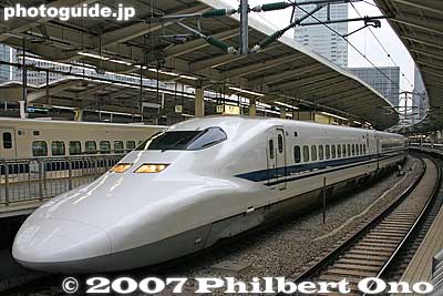 Fastest shinkansen train, Nozomi. Also see the [url=http://www.youtube.com/watch?v=yCEN7CJ-Cqs]shinkansen video at YouTube.[/url]
Keywords: tokyo chiyoda-ku JR train station shinkansen platform tracks