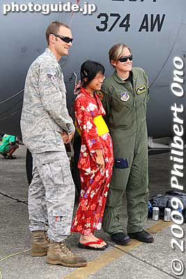 Girl in yukata kimono posing with military persons in uniform in front of the C-130.
Keywords: tokyo fussa yokota united states usa air base force military japanese-american japan america friendship festival airplanes jets aircraft 