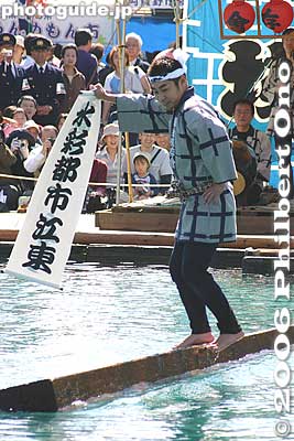 He tries again and succeeds in unfurling a banner which says "Koto Ward, Water Capital."
Keywords: tokyo koto-ku kiba kakunori log rolling