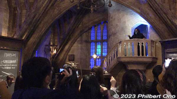 Defence Against the Dark Arts Classroom. There was a wand-waving lesson to defeat a Death Eater (right) on the balcony.
