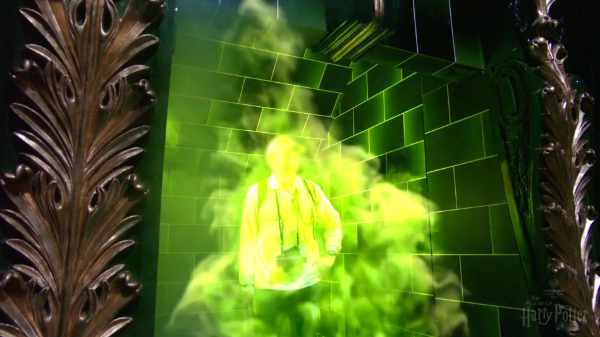 Coming out of the Floo Network fireplace next to Ministry of Magic. (Video screenshot). Another interactive activity where you walk out of the fireplace’s Floo powder flames upon arrival.
