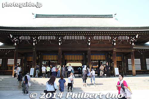Meiji Shrine's main worship hall. If you look closely at the wooden pillars, you can see numerous little cuts in the wood made by people throwing coins at the shrine during New Year's.
Keywords: tokyo shibuya-ku meiji shrine shinto japanshrine