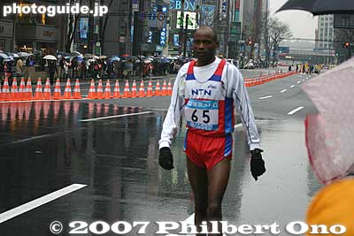 James Muwangi of Kenya quit the race right where I was. He earlier tried to keep up with the front runners.
