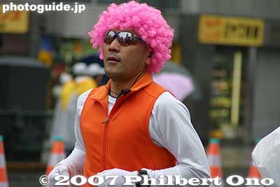 With a pink afro wig. Or is it his real hair??
Keywords: tokyo marathon runners race