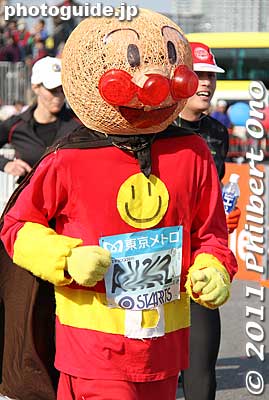Anpan Man, the head is a lamp shade. Great costume.
Keywords: tokyo koto-ku marathon runners big sight finish line 