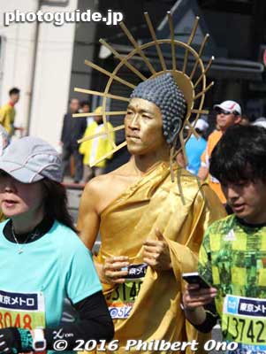 The Buddha. I didn't see Jesus Christ (carrying a large cross on his back) this year. Maybe this Buddha took his place.
Keywords: tokyo marathon 2016 cosplayer runners costumes japancosplayer