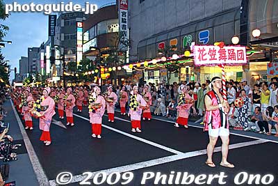 This is one of the main and best dance groups. They all dance to a song called "Hanagasa Ondo." A recording of the song is repeated continuously through the loudpseakers. 花笠音頭
Keywords: yamagata hanagasa matsuri festival tohoku flower hat dancers woman girls women kimono
