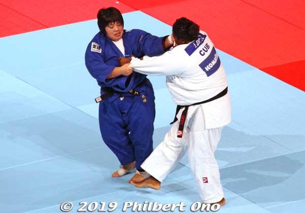 Heavyweight +78 kg judoka Sone Akira grapples with Cuba's Idalys Ortiz