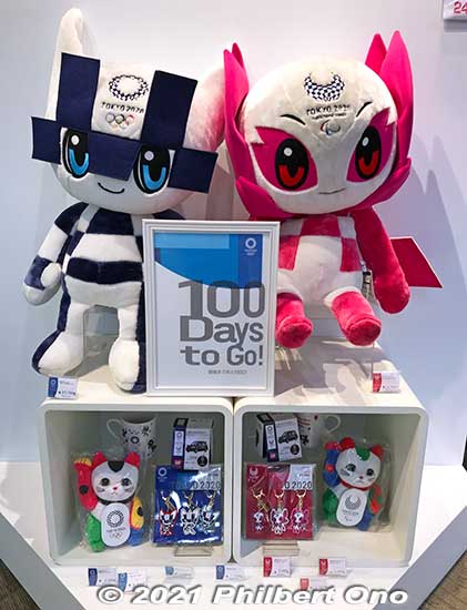 100 Days to Go!" display at a Tokyo 2020 official shop.