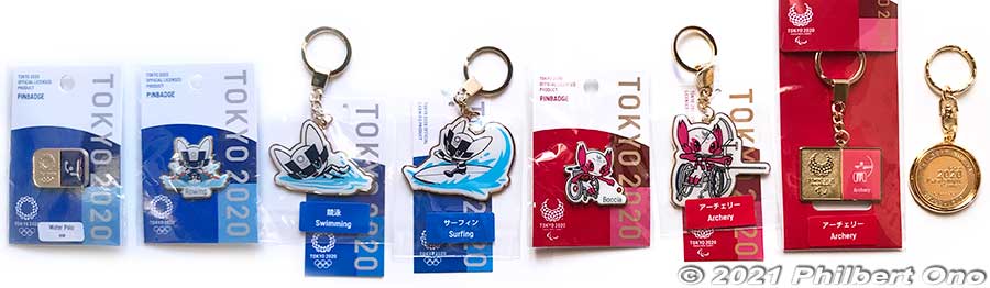 Tokyo 2020 pins and key chains sold by Tokyo 2020 Official Shops