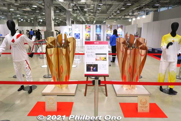 Tokyo 2020 Final Sale at Tokyo Sports Square displayed torch relay uniforms and mini cauldrons
