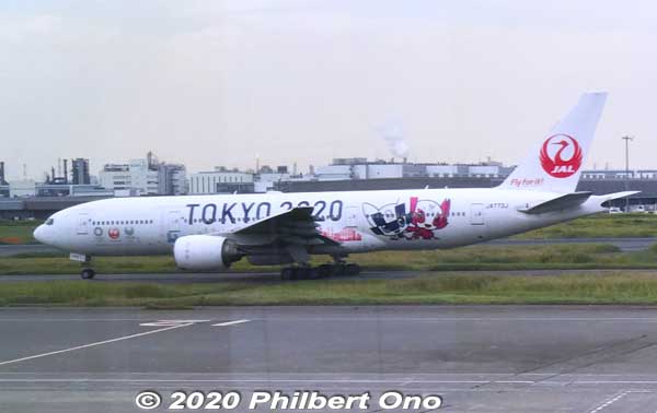 Japan Airlines Boeing 777-200 jet in Tokyo 2020 livery at Haneda Airport