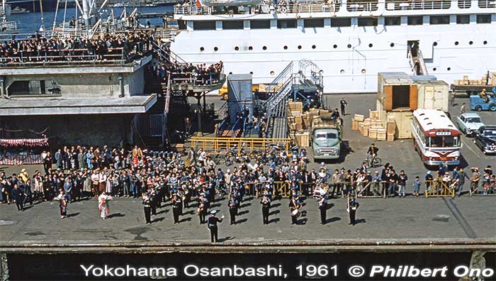 Welcome ceremony for an ocean liner arriving at Osanbashi Pier. 1961