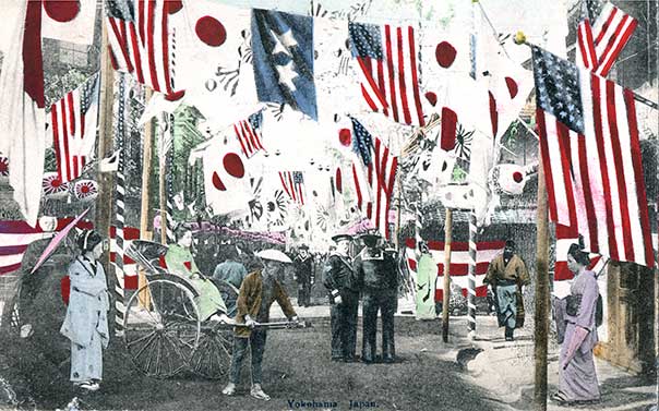 Yokohama street with U.S. and Japanese flags welcoming the Great White Fleet in 1908.
