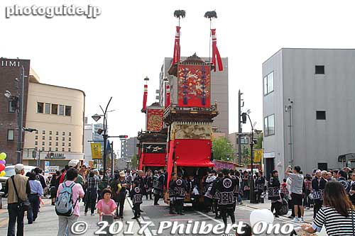The 31 floats are religious because they come from 10 neighborhoods in Handa and each belong to a Shinto shrine in their respective neighborhoods. 
They hold their own religious festival every spring. And every 5 years, they all line up in a large parking lot for this Handa Dashi Matsuri.

Keywords: aichi handa dashi matsuri festival floats