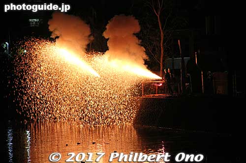There were riverside fireworks at 8 pm. These men are holding fireworks cannons (tezutsu hanabi) made of bamboo and filled with gunpowder. They last only several seconds.
Fireworks cannons are famous in the nearby city of Toyohashi. The festival was well worth seeing. 手筒花火
Keywords: aichi handa dashi matsuri festival floats